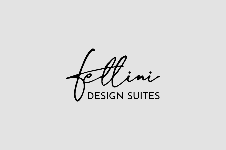 Fellini Design Suites – logo ufficiale della struttura di Roma, con scritta calligrafica nera e design minimal su fondo chiaro.